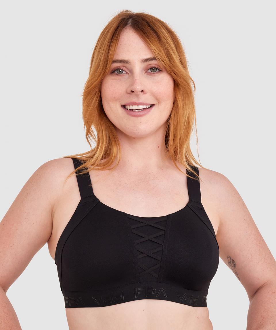Lucy is wearing a 12DD top and 12 bottom. She stands at 165cm/5'4in.