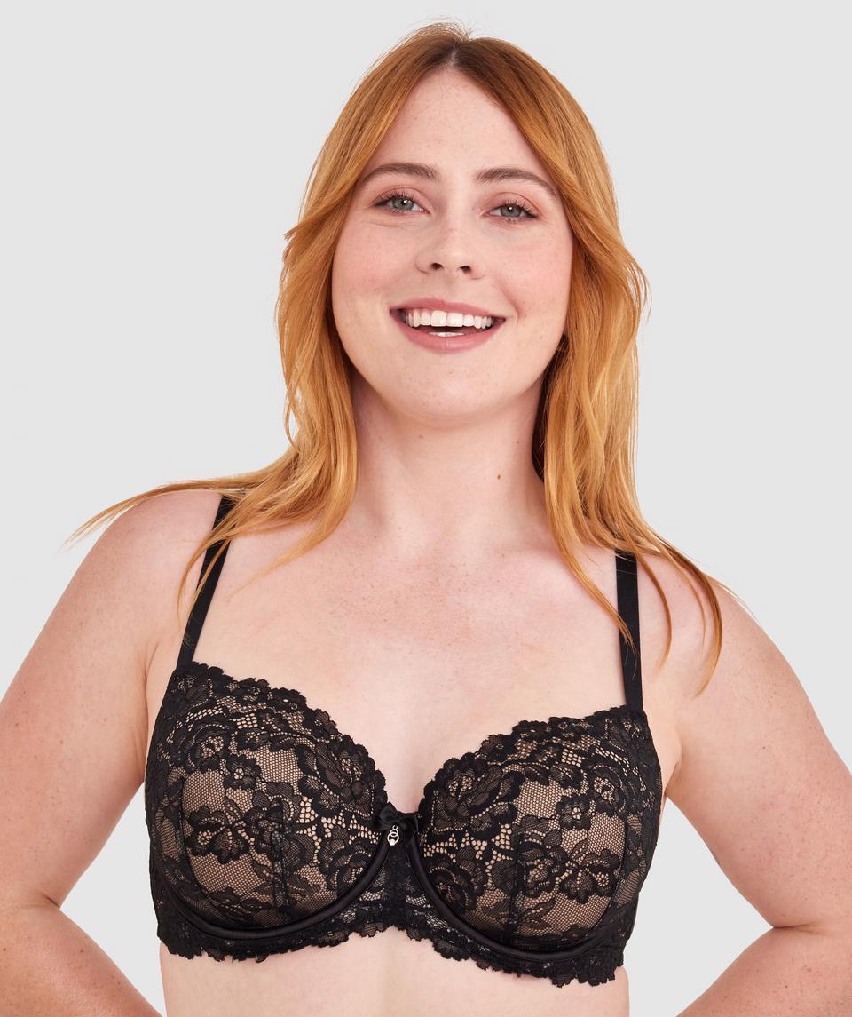 Lucy is wearing a 12DD top and 12 bottom. She stands at 165cm/5'4in.