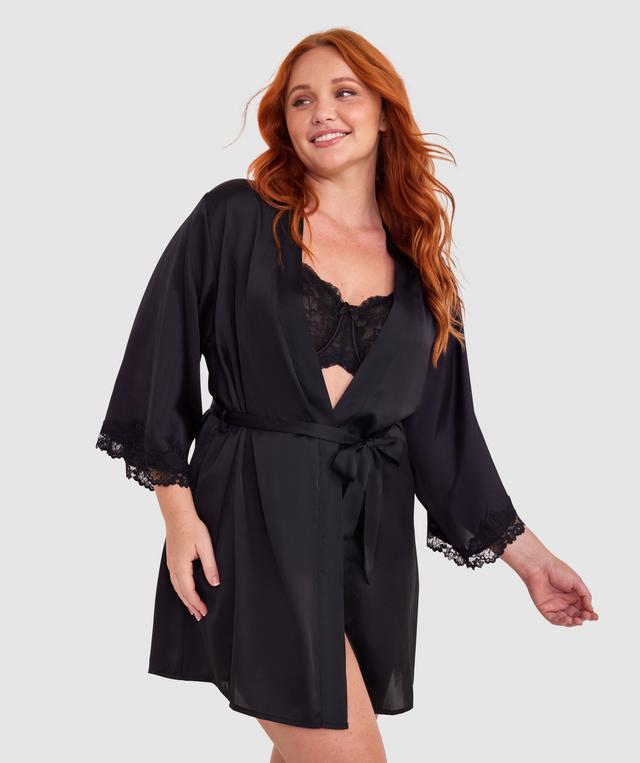 Brooke is wearing a 12DD/M top and 12/M bottom, with bust 97cm/40in, waist 81cm/31 1/2in, and hip 106cm/42 1/2in. She stands at 175cm/5'8in.