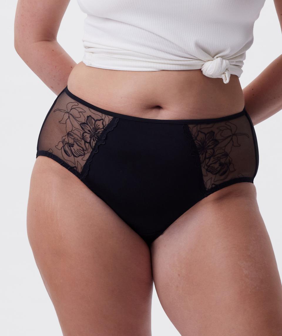 Jasmine is wearing a 12DD bra and size 12 underwear, with bust 96cm/38in, waist 77cm/30.5in, and hip 111cm/43.5in. She stands at 175cm/5'9in.