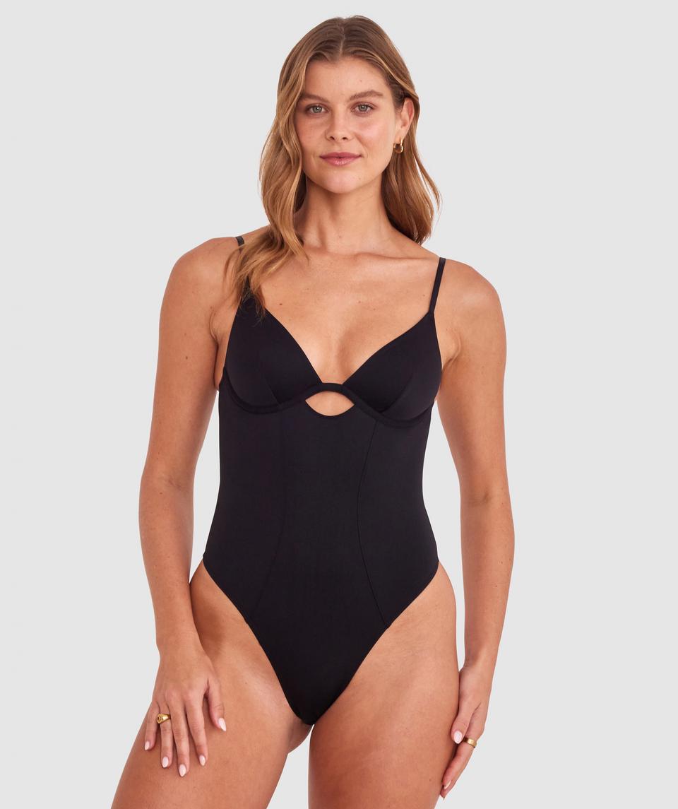 Olivia is wearing a 10B/C top and 10 bottom with bust 81cm/32in waist 65cm/25 1/2in and hip 99cm/39in. She stands at 177cm/5'9in.