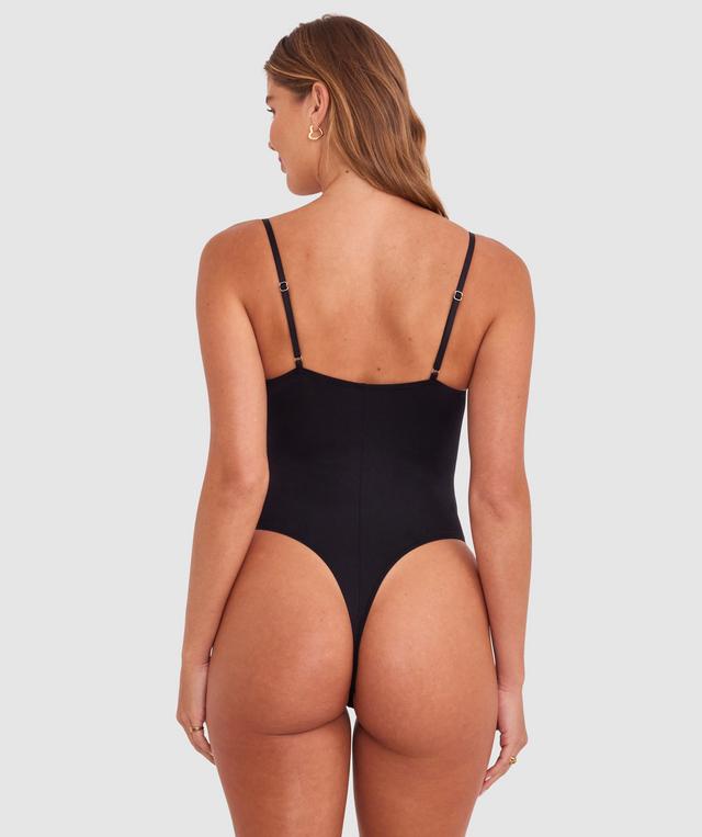 Olivia is wearing a 10B/C top and 10 bottom with bust 81cm/32in waist 65cm/25 1/2in and hip 99cm/39in. She stands at 177cm/5'9in.