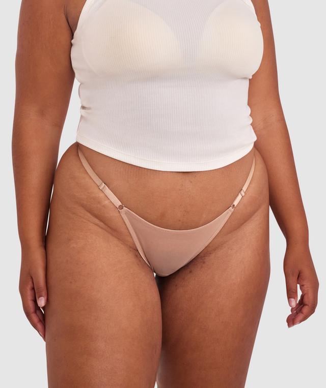 Paris is wearing a 16DD bra and 16 underwear, with bust 105cm/41.5in, waist 88cm/35.25in, and hip 121cm/48.25in. She stands at 178cm/5'10in.