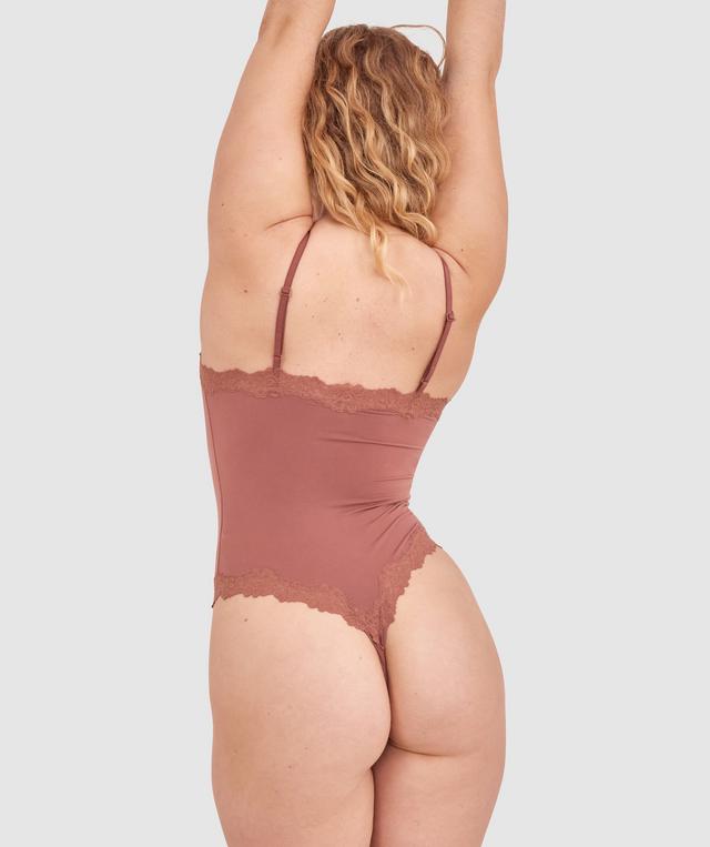 Tay G wears a size 12DD bra and size 12 underwear. She is 161cm tall and has measurements of 92cm bust a 71cm waist and 101cm hips.