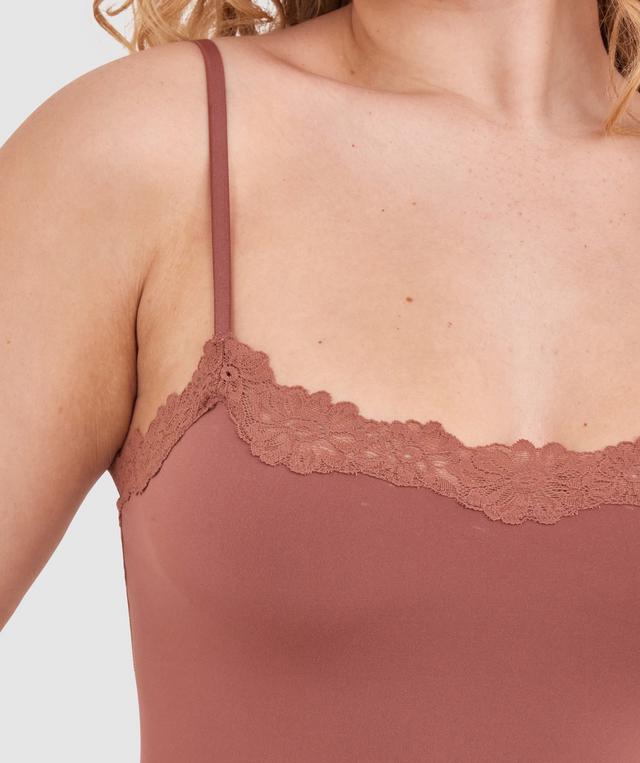 Tay G wears a size 12DD bra and size 12 underwear. She is 161cm tall and has measurements of 92cm bust a 71cm waist and 101cm hips.