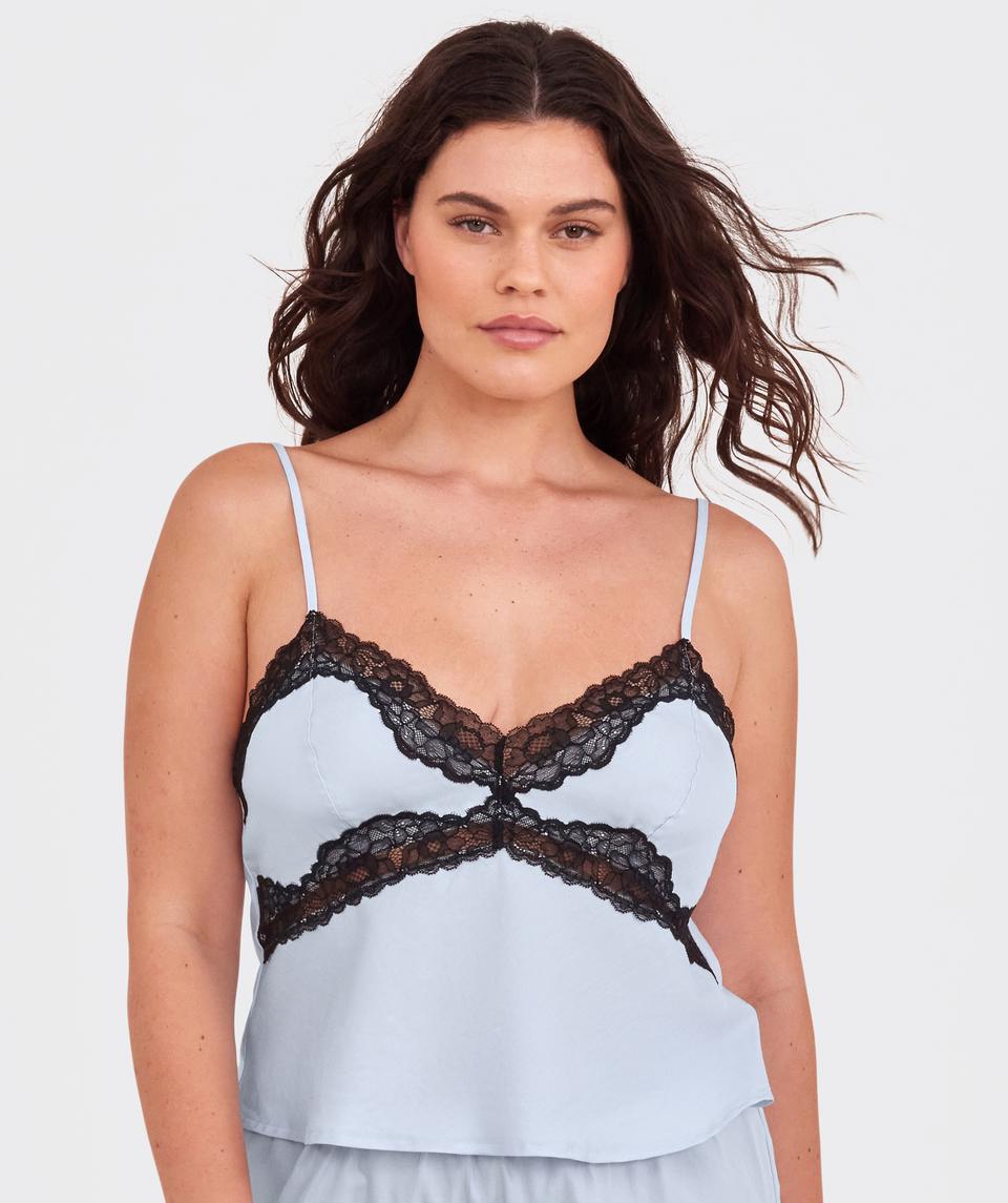 Jasmine is wearing a 12DD bra and size 12 underwear, with bust 96cm/38in, waist 77cm/30.5in, and hip 111cm/43.5in. She stands at 175cm/5'9in.